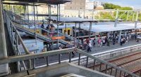 In an image acquired shows commuters at Ashfield station, in Sydney Friday 14 February 2025. Industrial action from the rail union is causing disruptions across Sydneys train network after negotiations between the union and state government broke down.    Picture - Michael Ruffles