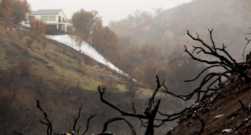 Thousands told to evacuate in L.A. as storms raise fears over burn scars and debris flow