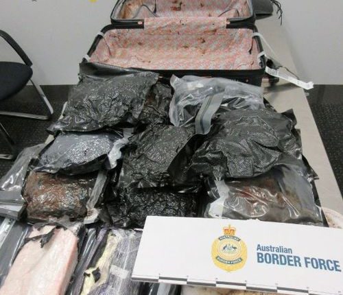Two travellers have been charged over allegedly importing drugs into Australia hidden in luggage at Melbourne Airport.
