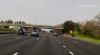 Video: Vehicle launches off overpass, plummets onto freeway below