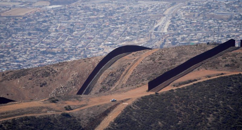 The U.S. Border with Mexico is seen in an aerial view Friday, Jan. 31, 2025, near San Diego. (AP Photo/Jae C. Hong)