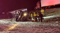 Woman pinned under truck after slipping on black ice, hospitalized in Urbana