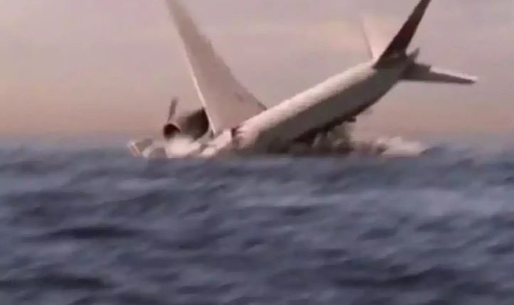 Airplane crashing into the ocean.