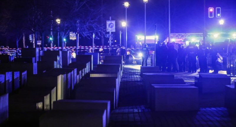 Police at the Holocaust Memorial in Berlin following an incident.