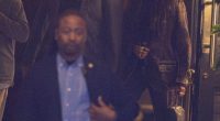 Michelle Obama and her brother Craig Robinson leaving a restaurant.