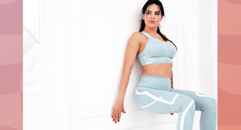 Woman doing a wall sit