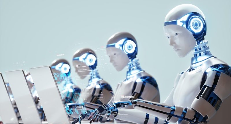 Illustration of robots using laptops.