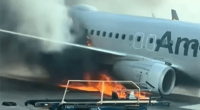 Airplane on fire at the airport.