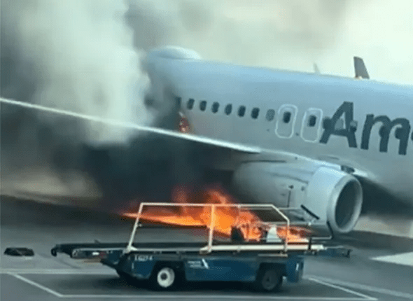 Airplane on fire at the airport.