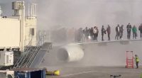 American Airlines plane erupts in flames at Denver Airport