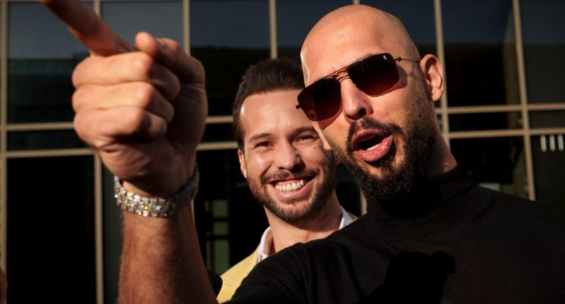 Andrew Tate and his brother Tristan outside a tribunal.