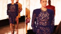 Bella Hadid closes out the Saint Laurent runway show in see-through blue lace look