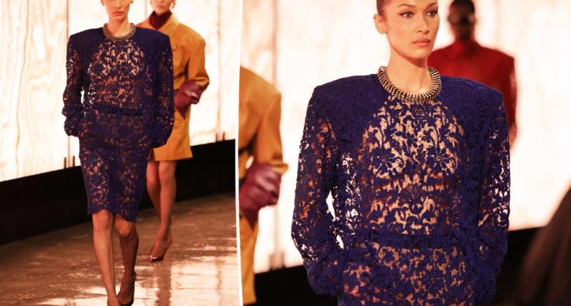 Bella Hadid closes out the Saint Laurent runway show in see-through blue lace look