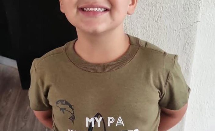 Boy, 7, fighting for life after crocodile rips arm off while he was playing just a few feet from parents on fishing trip