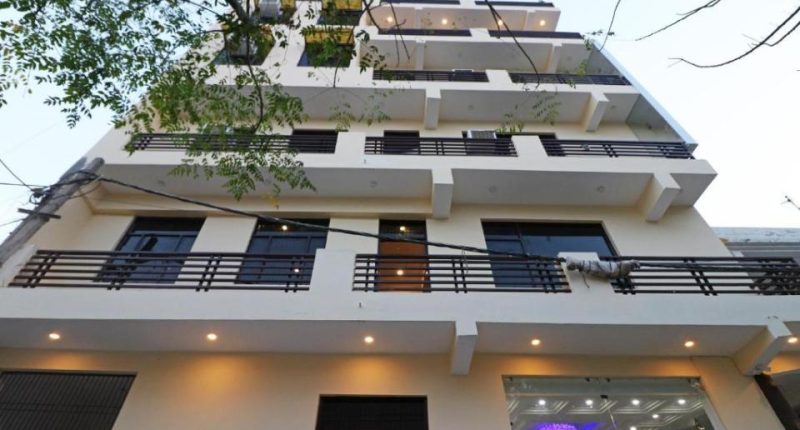 Exterior view of a multi-story building with balconies.