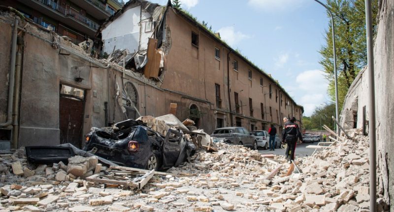 Emergency responders at the scene of a building explosion.