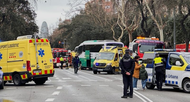 Emergency responders at the scene of a bus collision.