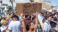 Brits warned ‘don’t come, we don’t need you’ by furious Spain anti-tourism activists – as they vow ‘worst summer EVER’
