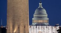 The US Capitol Building and Washington Monument at dusk.