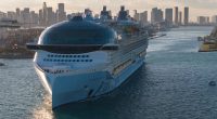 Aerial view of the Icon of the Seas cruise ship leaving PortMiami.