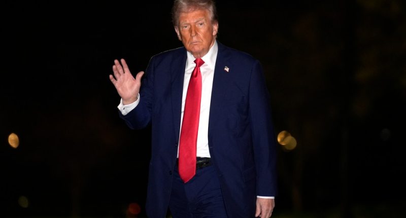 Donald Trump waving upon arrival at the White House.