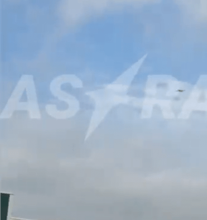 Astra logo in sky contrail.