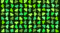 Illustration of many shamrocks, one of which has four leaves.