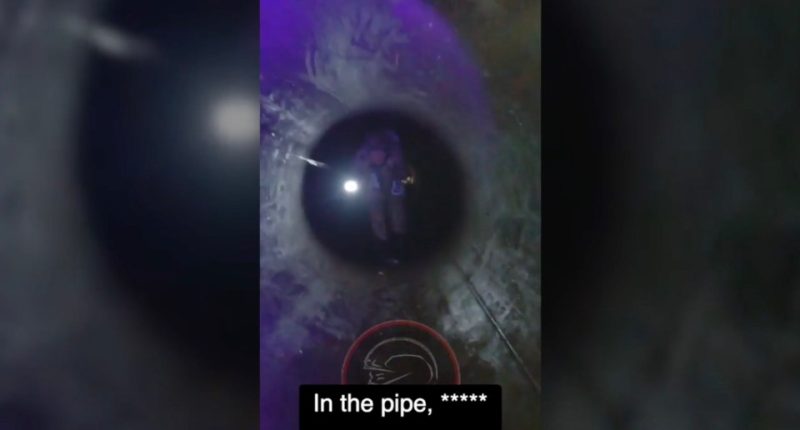 Russian soldier inside damaged gas pipeline.