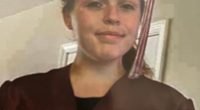Photo of Layla Santanello in a graduation cap and gown.
