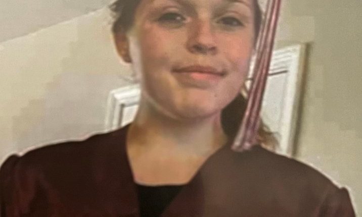 Photo of Layla Santanello in a graduation cap and gown.