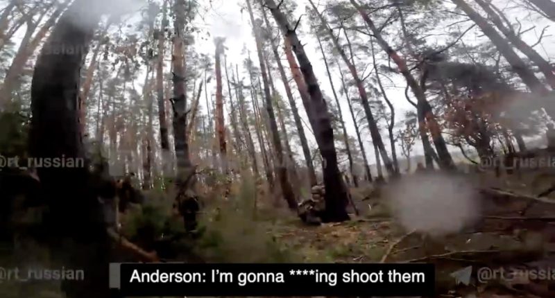 Footage of a soldier threatening to shoot approaching Russian troops.