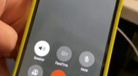 Smartphone displaying an incoming call from a sex hotline number.
