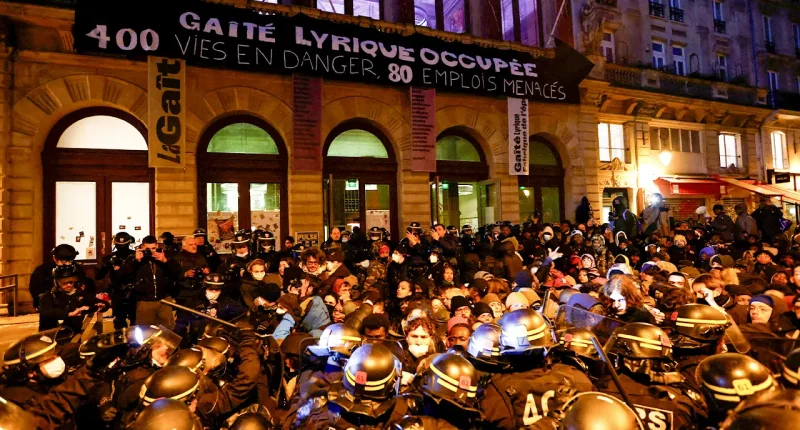 Hundreds of migrants evicted from Paris theater after squatting there for months