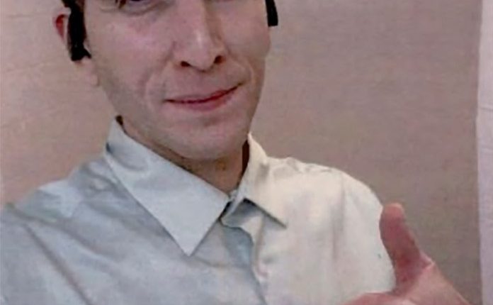 Selfie of Bryan Kohberger giving a thumbs up.