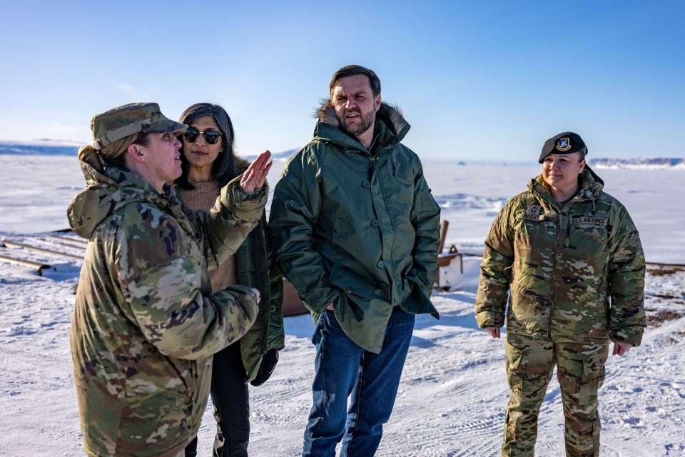 Vice President JD Vance and his wife touring a US military base in Greenland with military personnel.