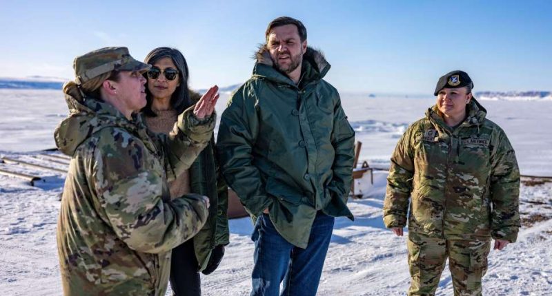 Vice President JD Vance and his wife touring a US military base in Greenland with military personnel.