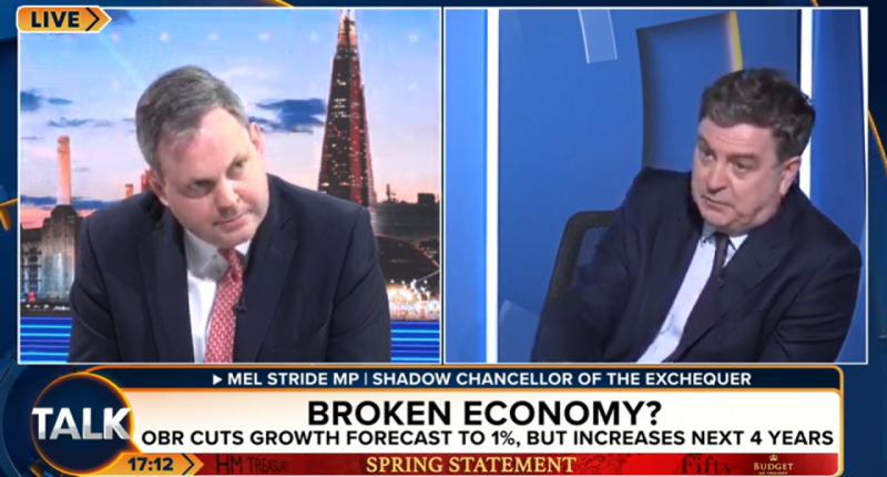 Screenshot of a TV segment discussing the UK economy, featuring Mel Stride MP.