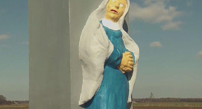 Renovated shrine statue in Studzionka, Poland.