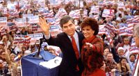 Michael Dukakis and his wife Kitty waving to supporters at a 1988 presidential campaign event.