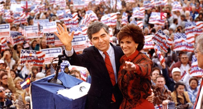 Michael Dukakis and his wife Kitty waving to supporters at a 1988 presidential campaign event.