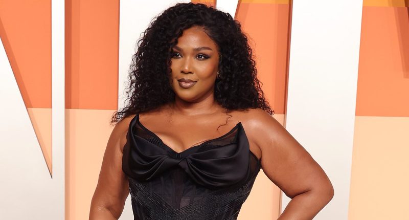 Lizzo showcases her slimmed physique at Vanity Fair's Oscars party