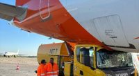 A yellow truck collided with an EasyJet plane on an airport tarmac.