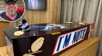 Man buried in Snickers-themed coffin