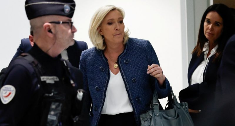 Marine Le Pen leaving a courthouse after a verdict.