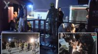 Pakistani security forces battle to free about 300 hostages aboard a hijacked train