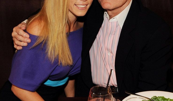 Kendra Wilkinson and Hugh Hefner at a birthday dinner.