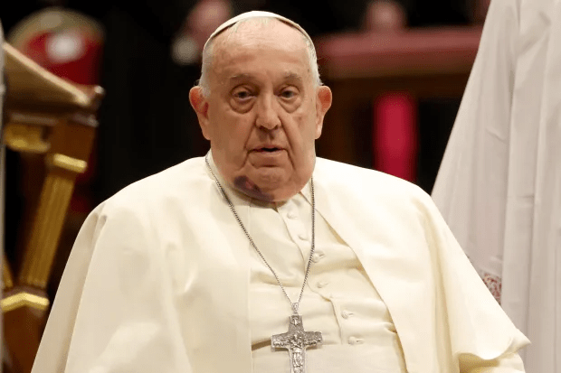 Pope Francis wearing papal vestments.