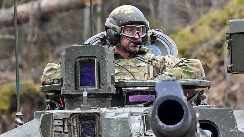 Prince William rides tank in Nato base visit just 90 miles from Russia