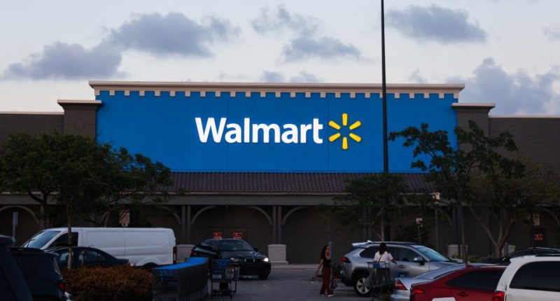 Walmart store exterior at dusk.