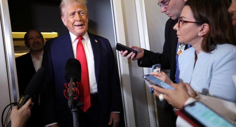 Donald Trump speaking to reporters.